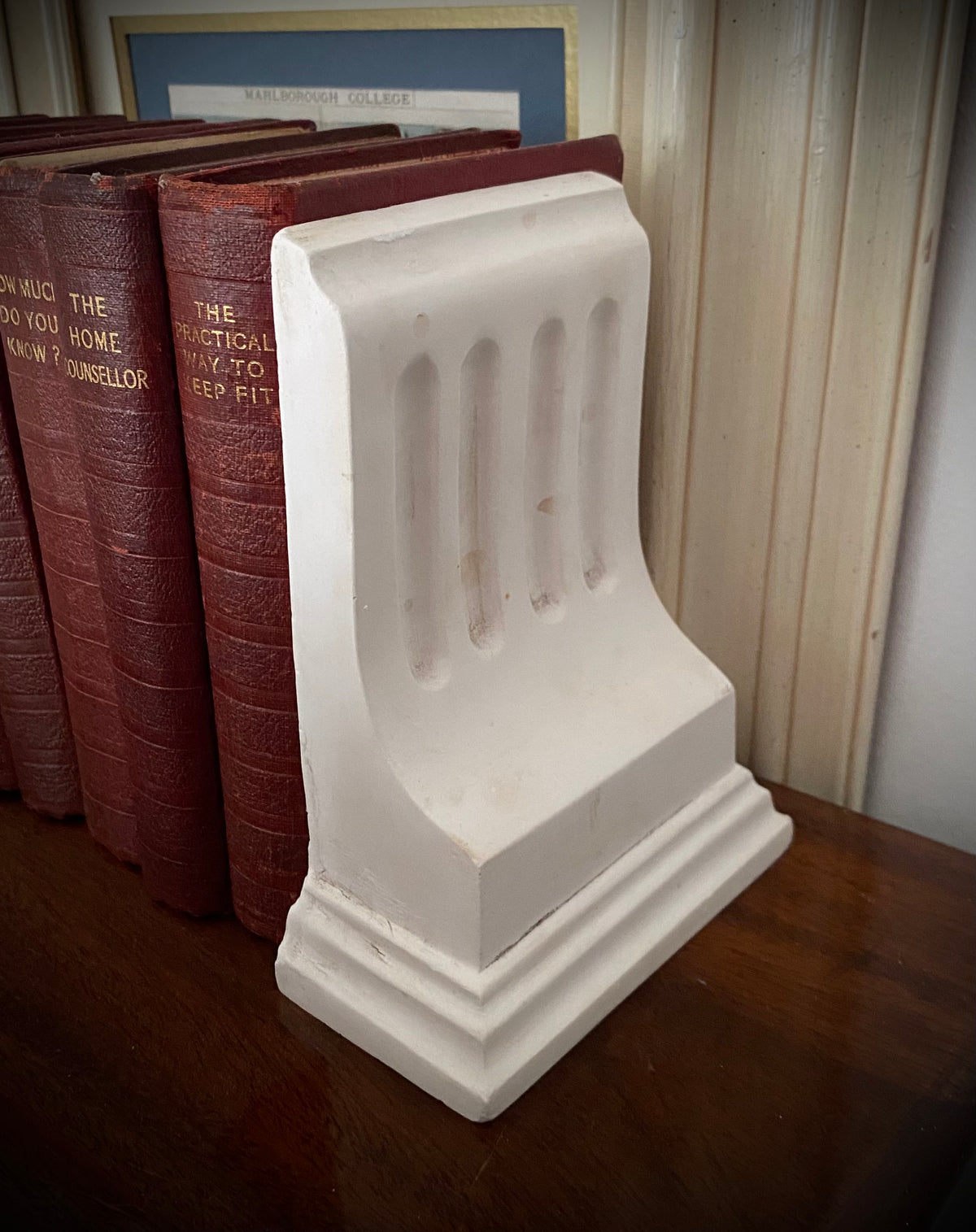 Beautiful plaster corbel book-end