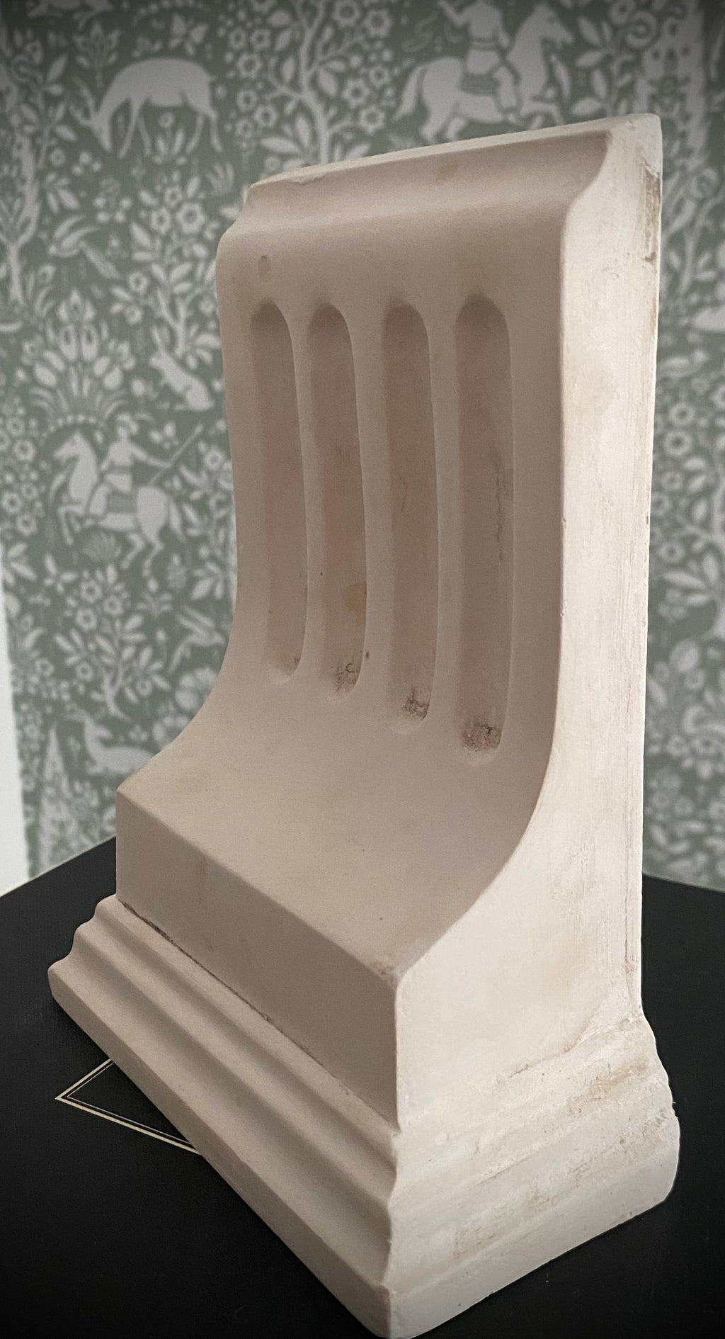 Beautiful plaster corbel book-end