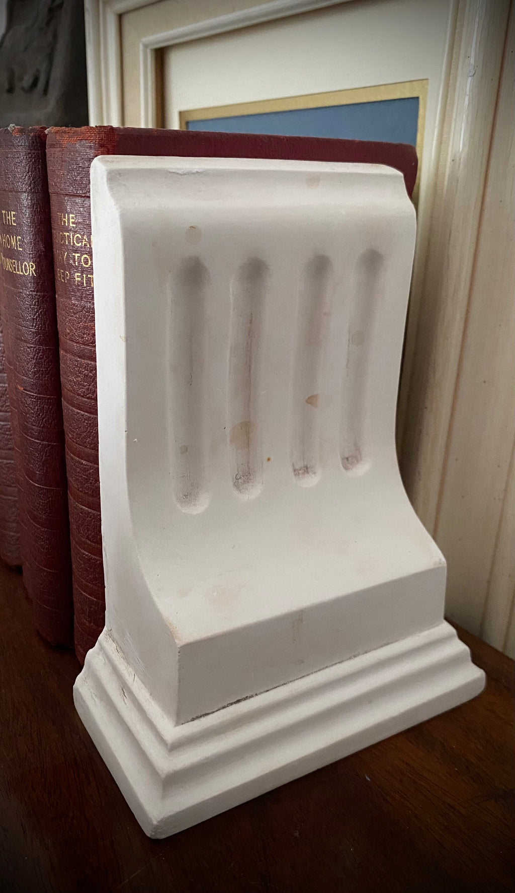 Beautiful plaster corbel book-end
