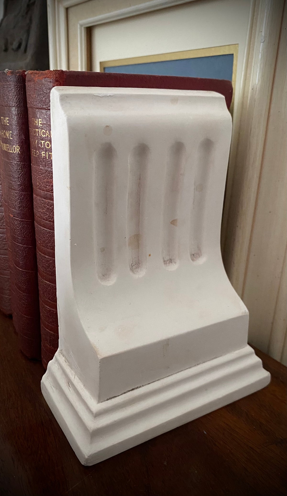 Beautiful plaster corbel book-end