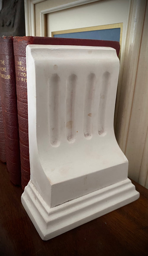 Beautiful plaster corbel book-end