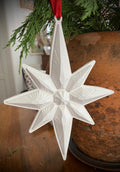 Large White Star, handmade in plaster, with red satin for hanging