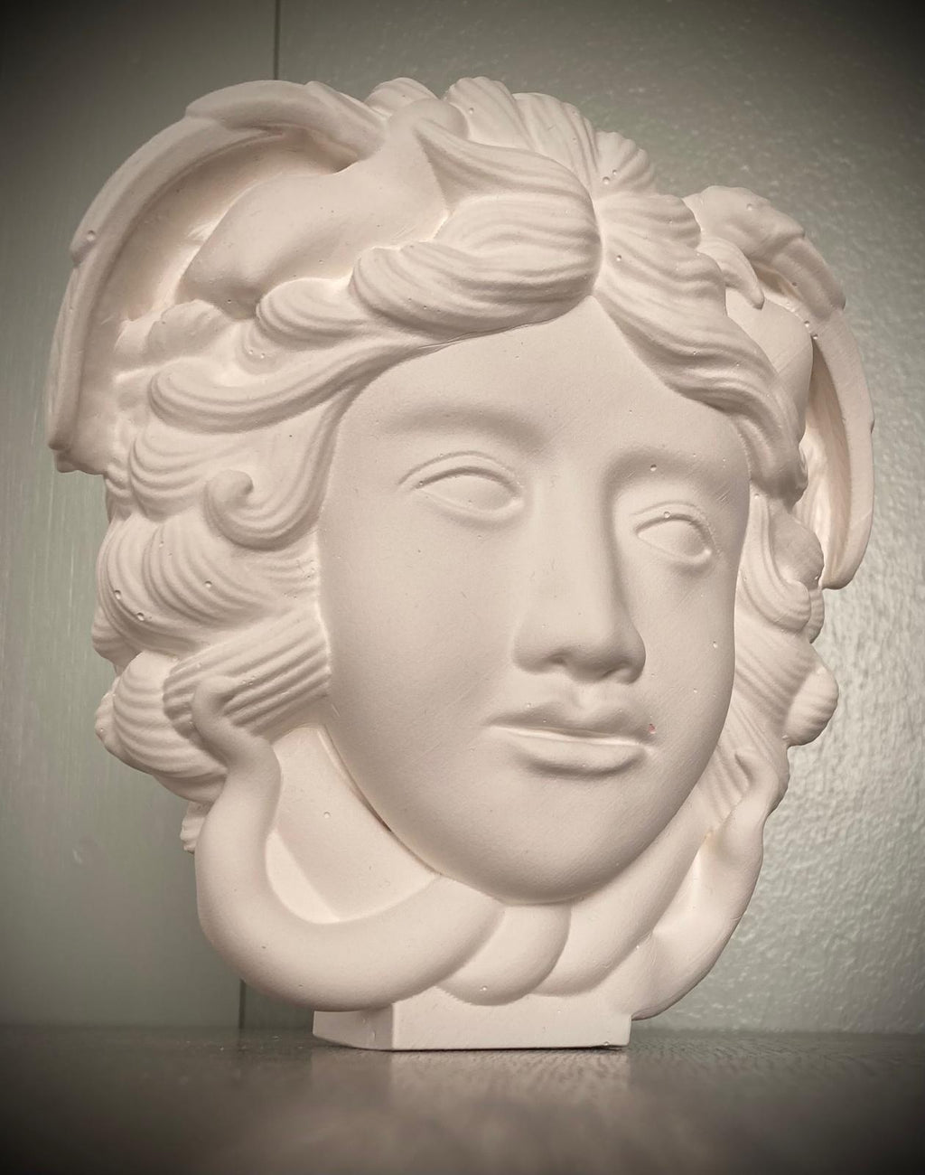 Sculpture bust of Medusa. This piece is a limited edition, signed and numbered