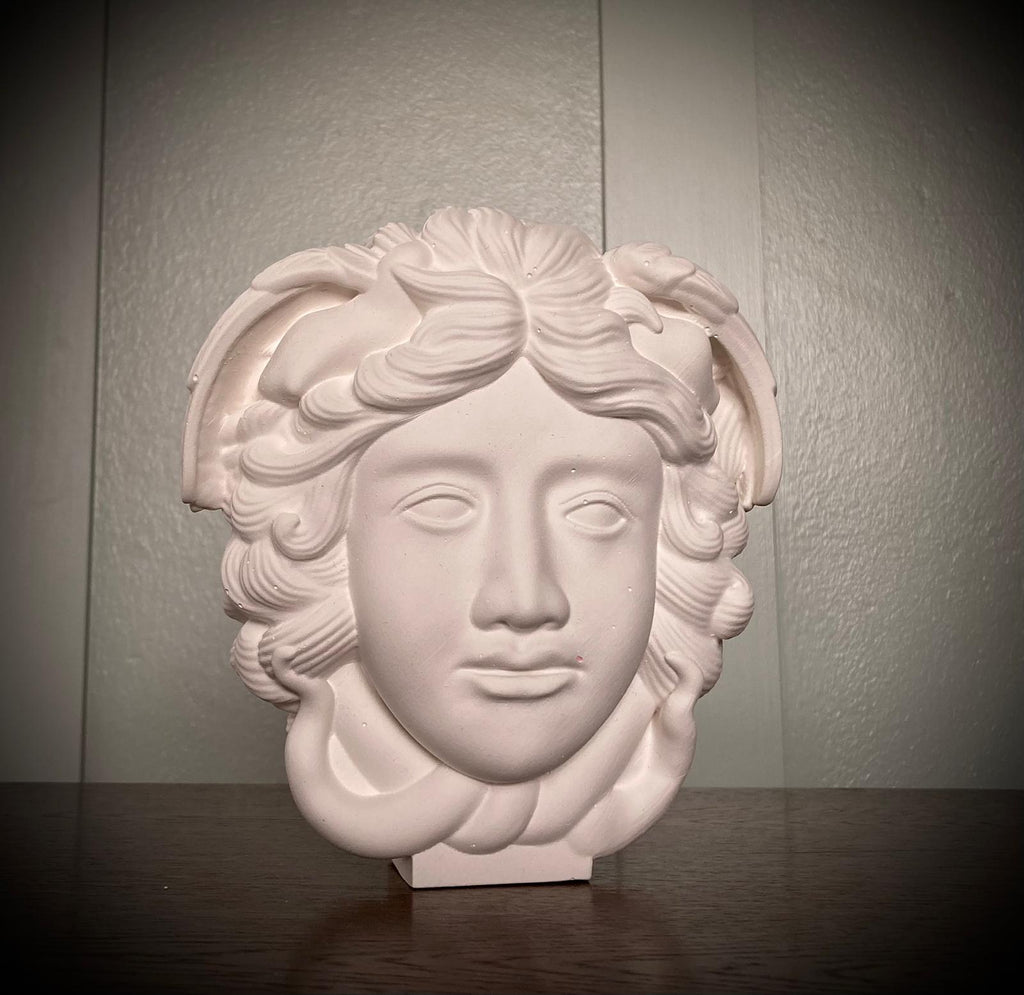 Sculpture bust of Medusa. This piece is a limited edition, signed and numbered